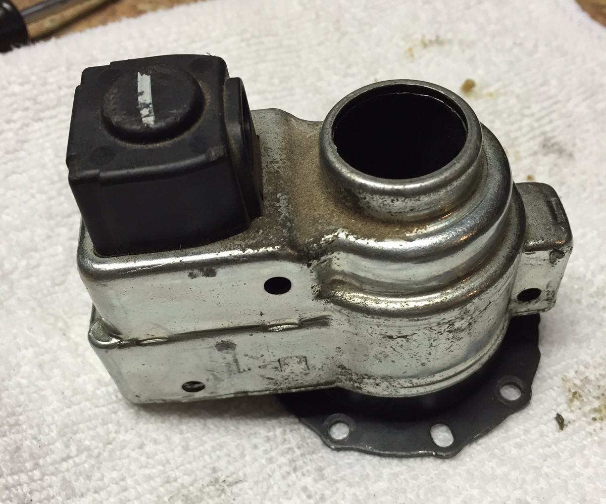 Mirror motor housing with retraction motor visible